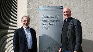Prof. Dr. Aziz und Prof. Dr. Schubert